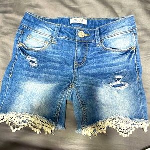 Blue Jean shorts. Bermuda style. Smoke free home. Some wear on bottom lace.